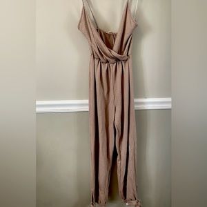 Cotton jumpsuit. Skinny straps, not adjustable. Very soft.